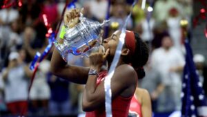 Coco Gauff emerges as the winner in the US Open women's final, captured in photos by CNN.