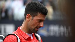 Serbia's Novak Djokovic leaves the court after losing his quarterfinals match of the Men's ATP Rome Open tennis tournament against Denmark's Holger Rune, at Foro Italico in Rome on May 17, 2023.