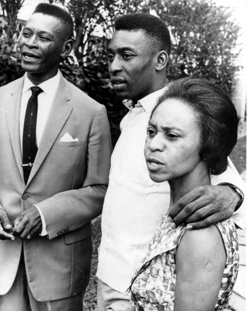 Pelé is seen with his parents, Dondinho and Celeste, in 1965. Dondinho was a soccer player himself and taught his son how to play.
