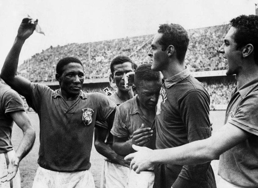 Pelé cries on Brazilian teammate Gilmar after winning the World Cup in 1958. In addition to scoring twice in the final, Pelé scored a hat trick in the semifinal win against France. He also scored the team's lone goal in the quarterfinal win over Wales.