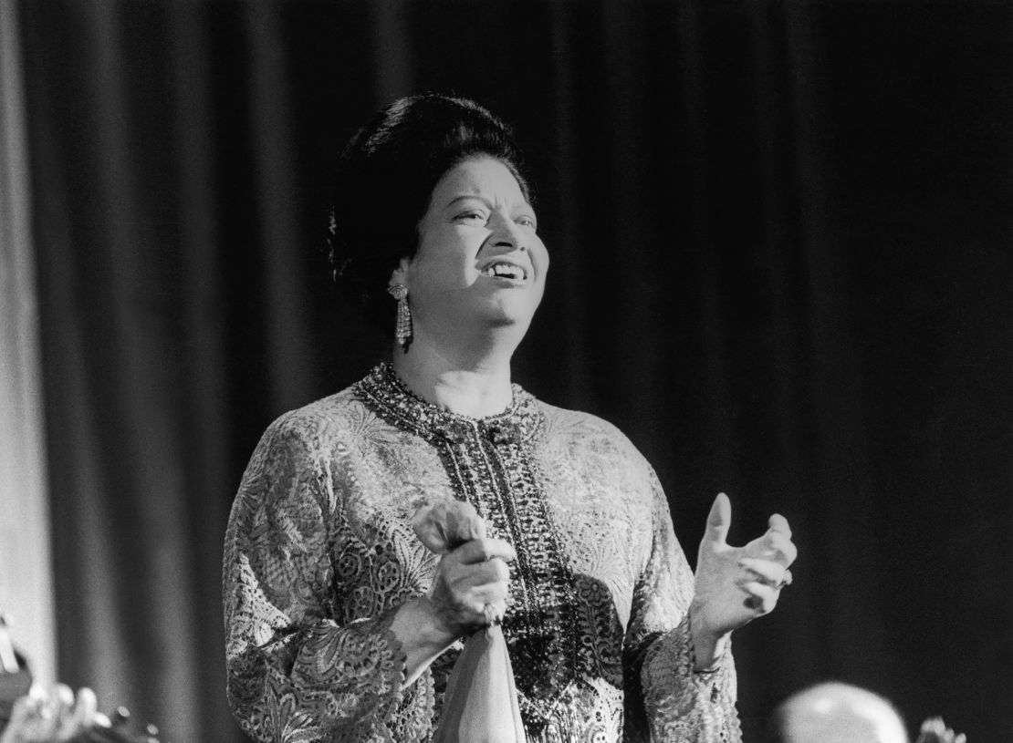 Egyptian singer Umm Kulthum performing onstage at the Olympia, in Paris on November 14, 1967.