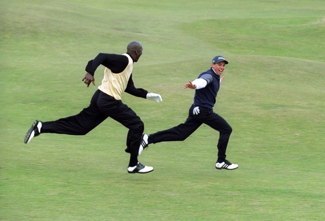 Garcia leads Jordan in a sprint down the 16th fairway of the St. Andrews Old Course during the Pro-Am of the Alfred Dunhill Cup, 1999.