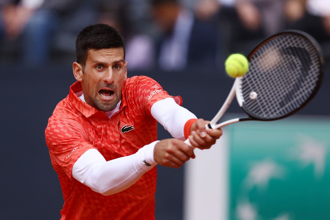 Djokovic plays a backhand against Holger Rune at the Italian Open. 