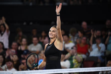 Aryna Sabalenka celebrates winning against Victoria Azarenka.