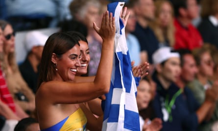 Spectators cheer during the 2023 men’s singles final between Stefanos Tsitsipas of Greece and Novak Djokovic of Serbia at Melbourne Park