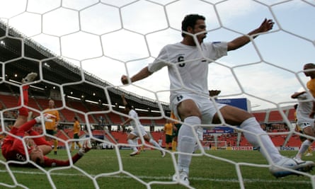 Iraq’s Saleh Sadir celebrates as Nashat Akram (not pictured) scores against Australia