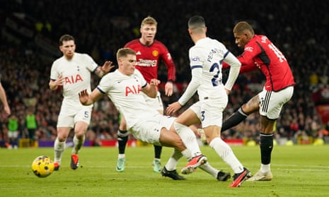 Manchester United's Marcus Rashford, right, scores his side's second goal.