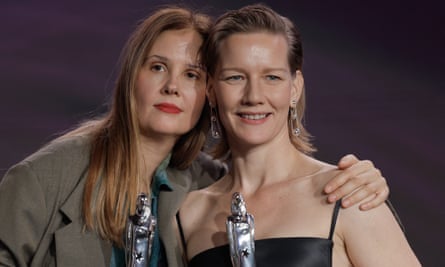 Anatomy of Fall director Justine Triet, left, with the film’s star, Sandra Hüller, at the European film awards in Berlin, 9 December 2023.