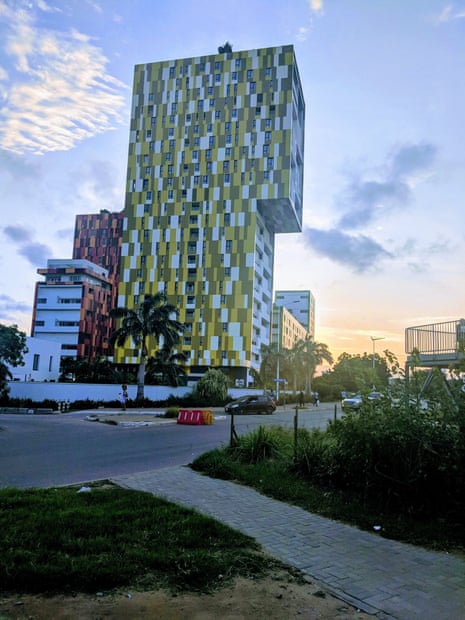 sky bar accra is made from mottled cladding, and looks like onana’s denim outfit 