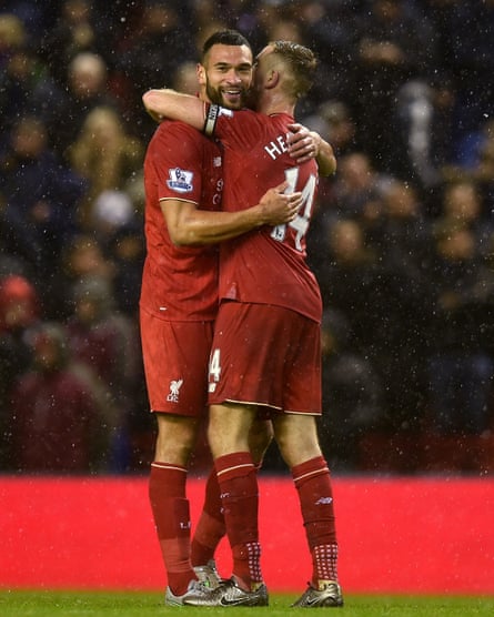 Steven Caulker and Jordan Henderson after the Premier League match between Liverpool and Arsenal at Anfield in 2016