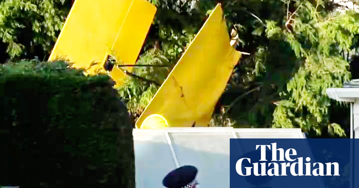A pilot was hospitalized after crash-landing their plane in a garden in Wales.