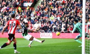 Brighton dominates 10-man Sheffield United as Simon Adingra scores twice.