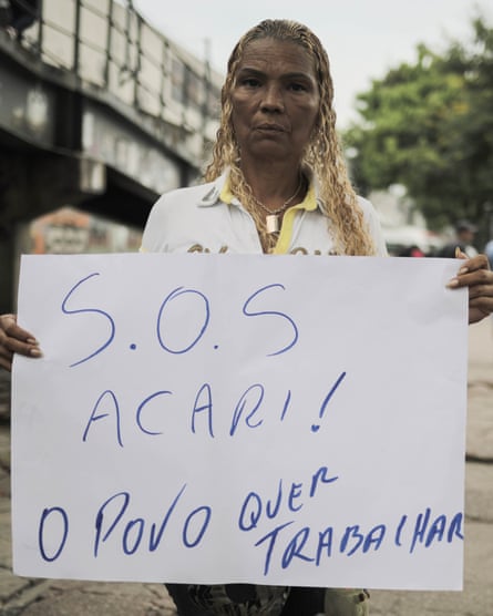 Underwear saleswoman Luciana Rodrigues protests against the closure of the open-air market.