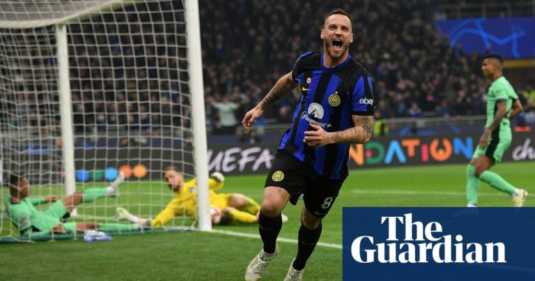 Inter’s forward Marko Arnautovic scores, giving them a small lead over Atlético Madrid in the round of 16.