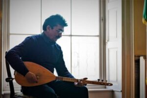 The universal language of music: the success story of a Syrian refugee in the Irish folk music scene.