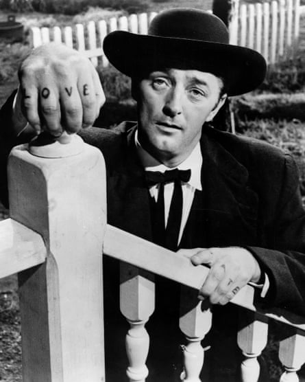 Preacher man … Robert Mitchum as a biblical con artist in The Night of the Hunter, 1955.