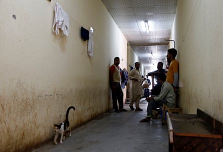 Asian workers gather at their accommodation in Qadisiya labour camp, Saudi Arabia