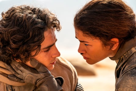 This image released by Warner Bros. Pictures shows Timothee Chalamet, left, and Zendaya in a scene from “Dune: Part Two.” (Niko Tavernise/Warner Bros. Pictures via AP)