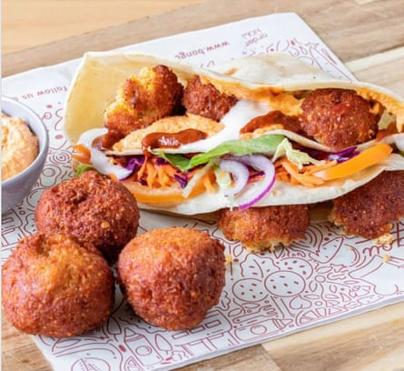 An akara falafel flatbread sandwich from Bongou Cafe.