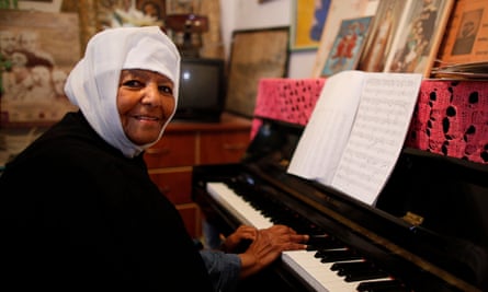 Emahoy Tsegué-Maryam Guèbrou at her piano.