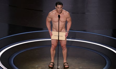 John Cena presents the award for best costume design.