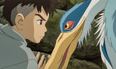 A still from an animated film where a boy stares into the eyes of a blue-crested heron