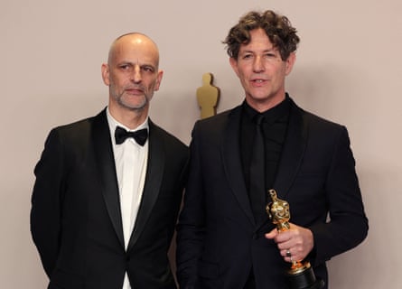 Jonathan Glazer and James Wilson at the Oscars.
