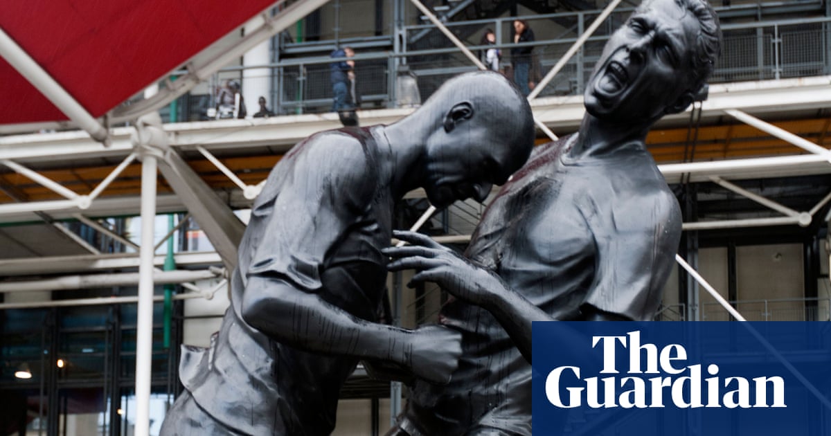 Some people are on the plinth … an XI of football statues – in pictures