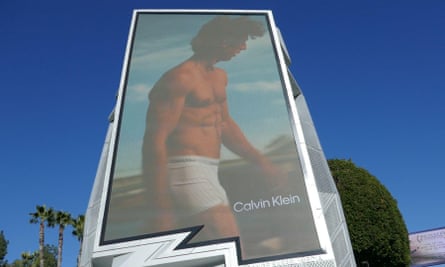 Billboard showing actor wearing a pair of boxer shorts.