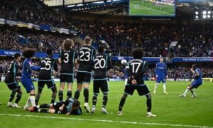 The result of a chaotic match saw 10-man Leicester fall to a late double by Chelsea, securing a spot in the FA Cup semifinals for the latter team.