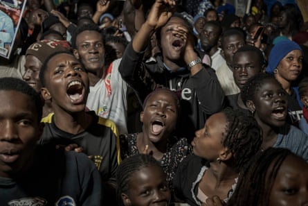 People celebrate the presumed win of Bassirou Diomaye Faye in Senegal’s presidential elections in Dakar