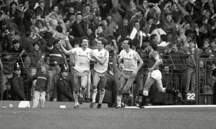 Ray Stewart (left) is congratulated by Tony Cottee and Alan Dickens after scoring a penalty in West Ham’s FA Cup fifth-round replay win at Old Trafford in March 1986