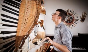 ‘A special bond between music and art’: Bath piano shop turns old parts into palette