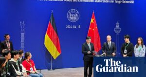 German chancellor urges Chinese industry bosses to play fair in EU market