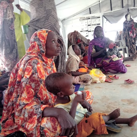 Badria Ahmed with her son, Noureldeen Ahmed Eisa in the Zamzam camp in El Fasher.