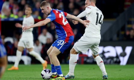 Crystal Palace’s Adam Wharton in action with Manchester United’s Christian Eriksen