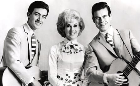 As part of the Springfields trio with her brother Tom, right, and Tim Feild, in 1962.