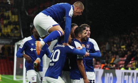 Sam Morsy (centre, with beard) looks at the fans after scoring against Watford