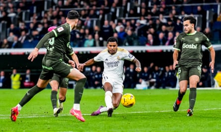 Real Madrid’s Rodrygo, centre, scores his side’s fourth goal against Girona in February