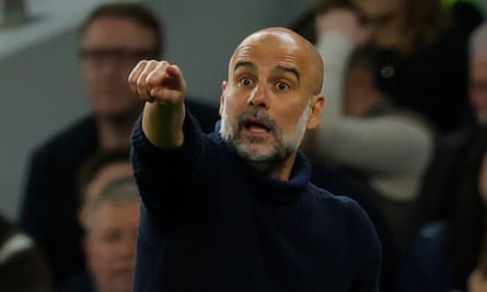 Pep Guardiola gestures on the sidelines during victory over Tottenham