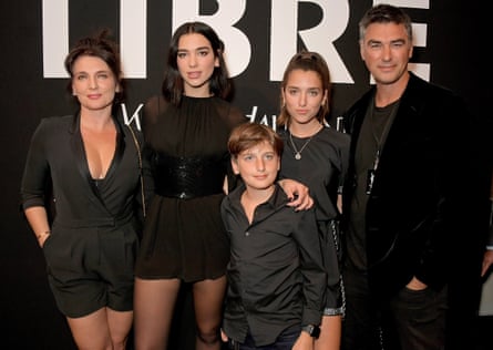 Dua Lipa posing with her family, all dressed in black – her mother, Anesa, brother, Gjin, sister, Rina, and father Dukagjin