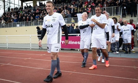 Robert Pires alongside his former France teammate Didier Deschamps and behind the president of France, Emmanuel Macron, at a recent Variétés Club charity match near Paris.