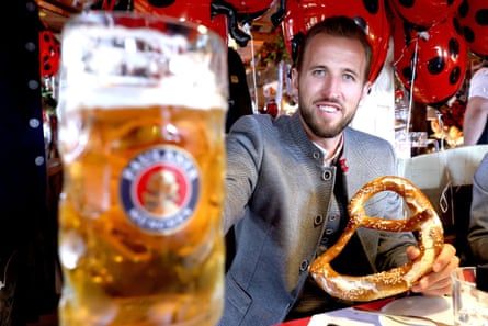 Harry Kane enjoys a beer and a giant pretzel