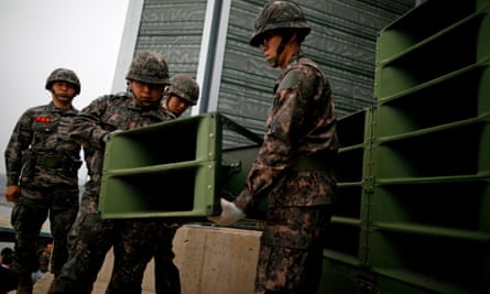 South Korean soldiers dismantle loudspeakers in 2018 set up for propaganda broadcasts near the demilitarised zone separating the two Koreas in Paju, South Korea