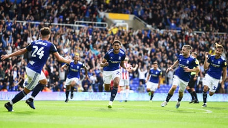 Jude Bellingham celebrates after scoring against Stoke City, on his home debut, in August 2019, to become, aged 16 years and 63 days, the youngest player to score for Birmingham City