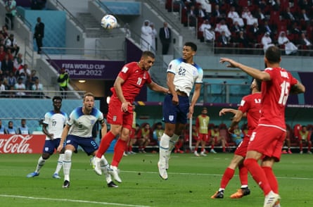 Jude Bellingham heads home to score England’s opener against Iran at the 2022 World Cup in Qatar.