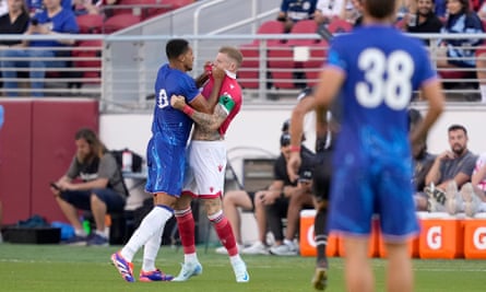 Chelsea defender Levi Colwill (left) gets to grips with Wrexham’s James McClean.