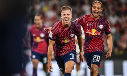 Dani Olmo celebrates with Xavi Simons at RB Leipzig.