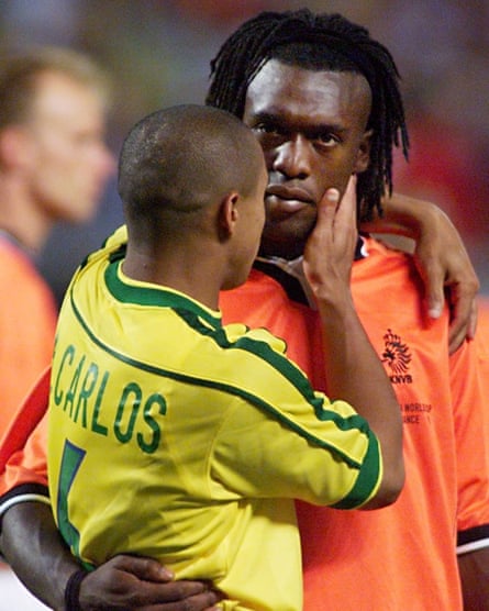 Roberto Carlos consoles his clubmate Clarence Seedorf after the 1998 World Cup semi-final