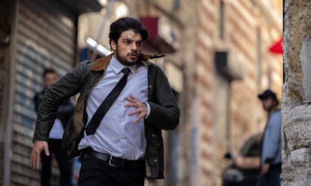 Ethan Kai as Suleyman runs through the streets in The Turkish Detective.